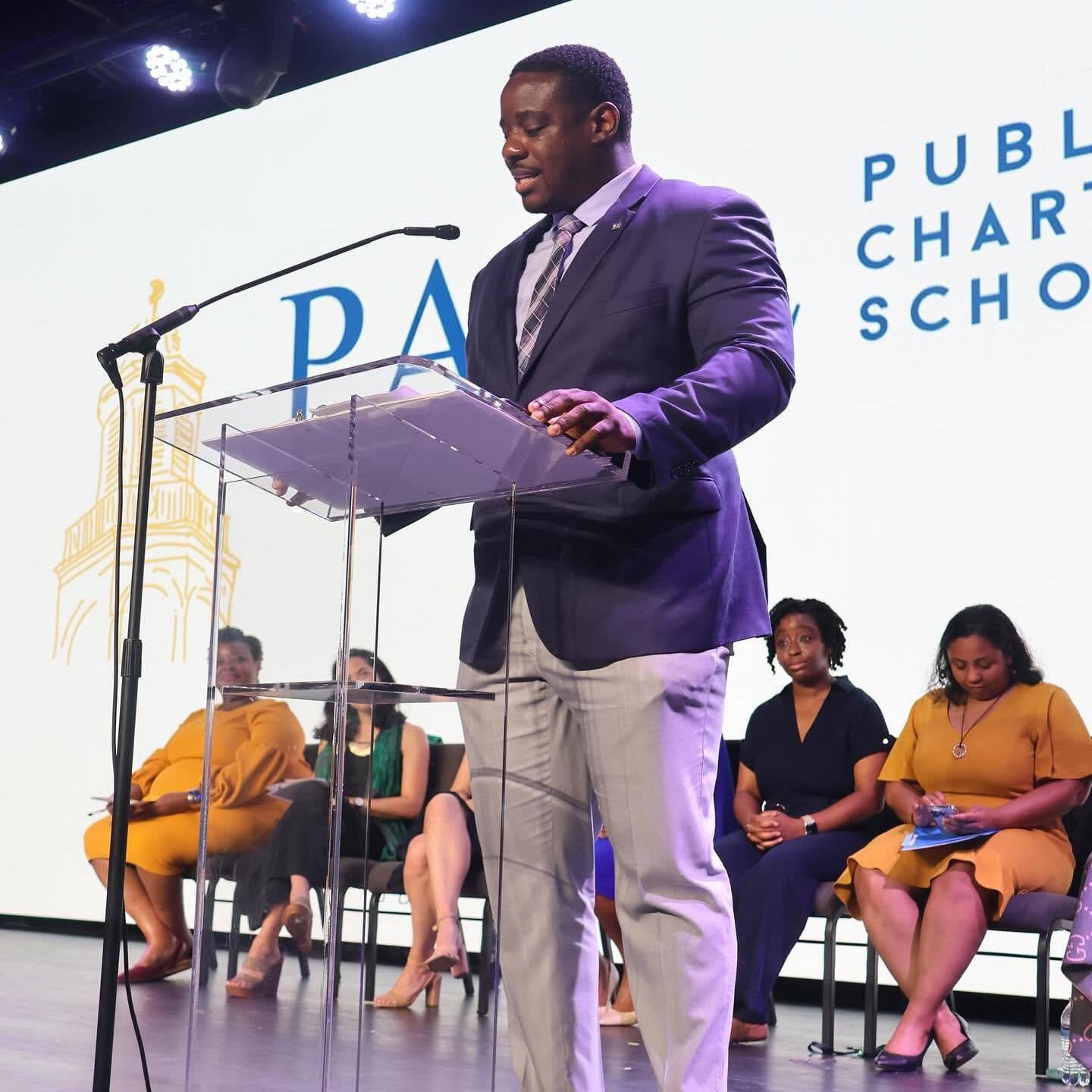 Michael Babb speaking at a Paul Public Charter School event.