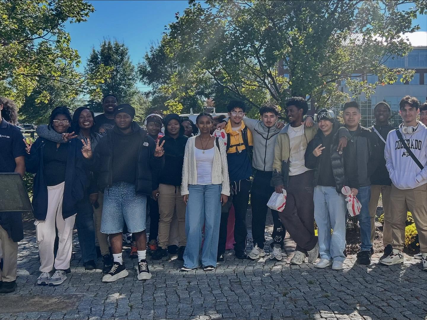 Michael Babb with students during a college visit.